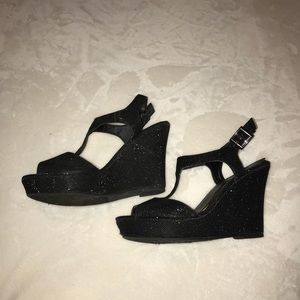 Shiny black wedge shoes